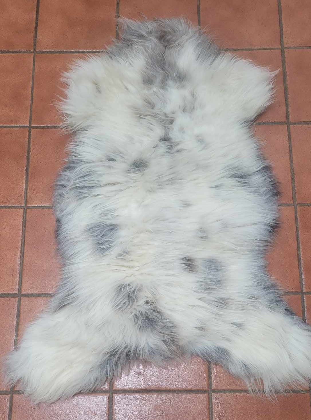 Ethically sourced grey and white soft sheepskin rug for Hygge and mountain decor