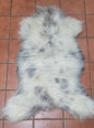 Ethically sourced grey and white soft sheepskin rug for Hygge and mountain decor
