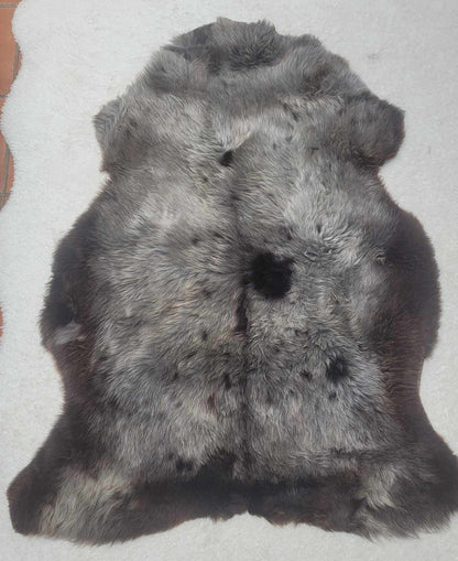 ethically sourced natural sheepskin rug soft brown and black