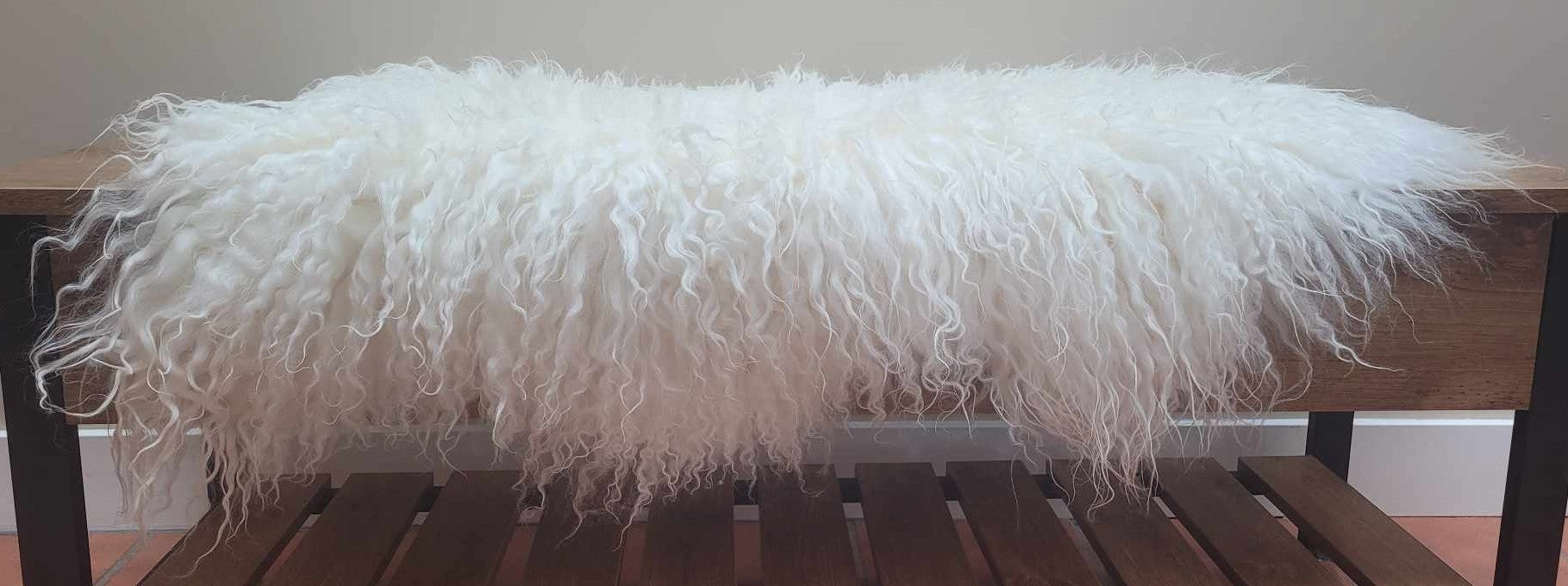 Ethically sourced curly Icelandic sheepskin rug for Hygge and mountain decor