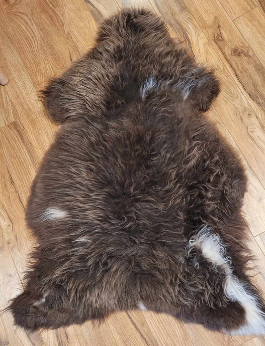 Ethically sourced soft brown sheepskin rug for Hygge and mountain decor