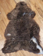 Ethically sourced soft brown sheepskin rug for Hygge and mountain decor