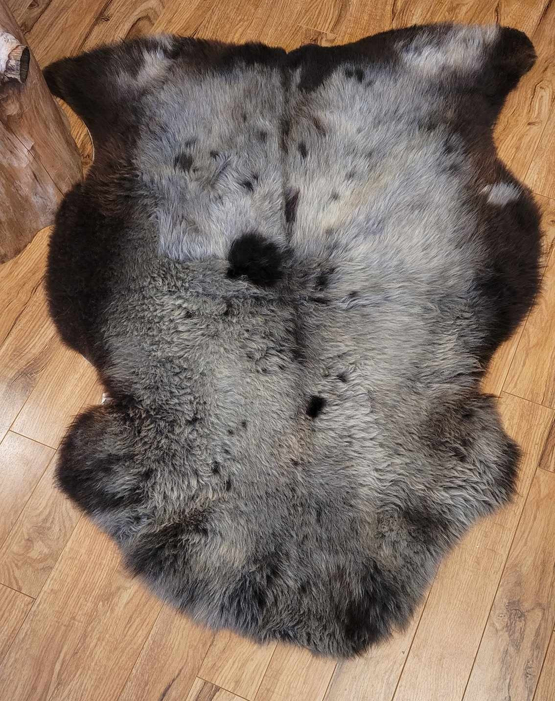 ethically sourced natural sheepskin rug soft brown and black
