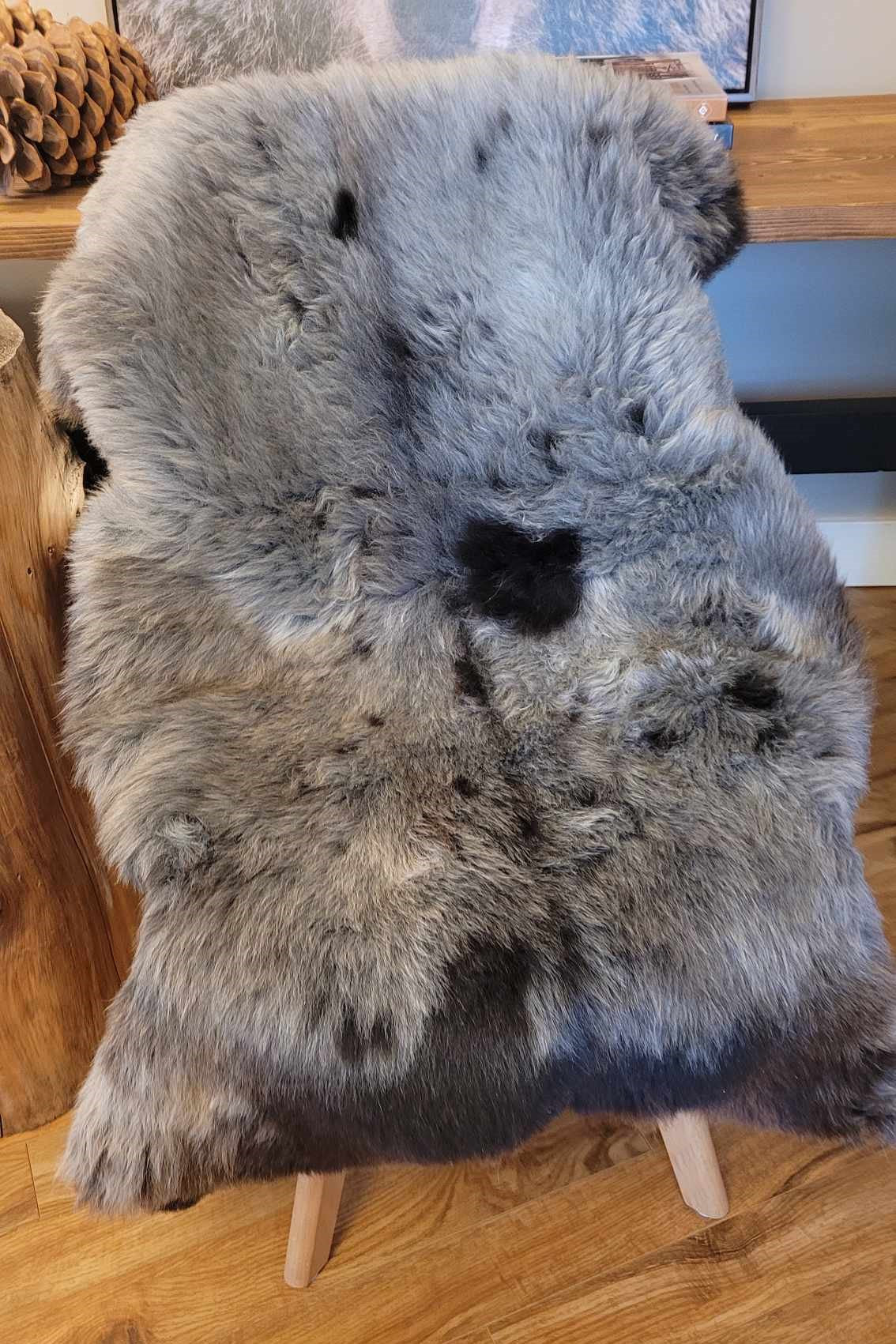 ethically sourced natural sheepskin rug soft brown and black