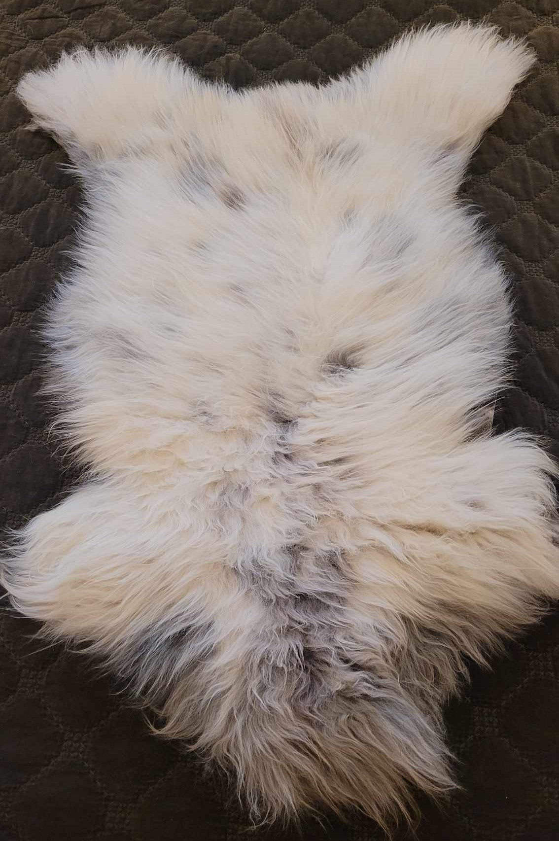 Ethically sourced grey and white soft sheepskin rug for Hygge and mountain decor